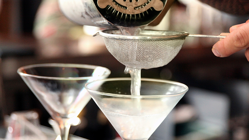 A fine-mesh strainer is the best way to strain out stuff like ice cubes or herbs leaves