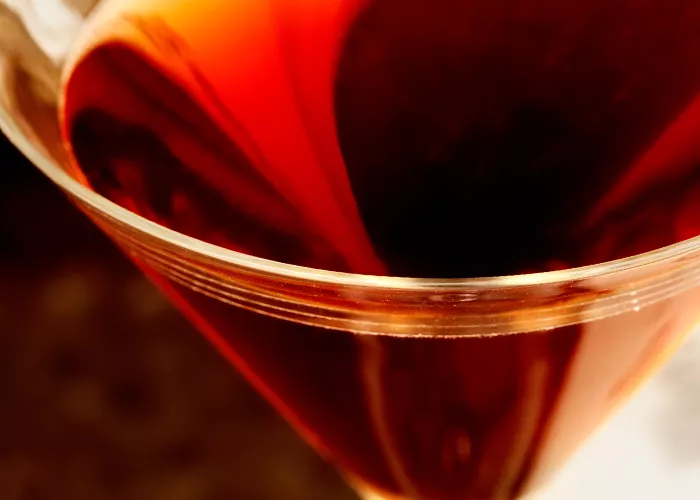A glass ofChili Chocolate Orange with ice, on the table.