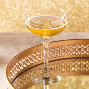 A glass with a drink and ice