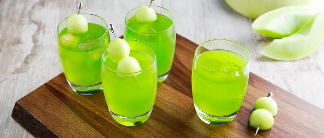 Four glass filled with melon ball
