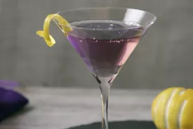 Thumbnail of a video explaining "How to Make a Purple Haze Martini" in bartending 101 
